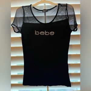 Women’s t shirt with mesh shirt sleeves.